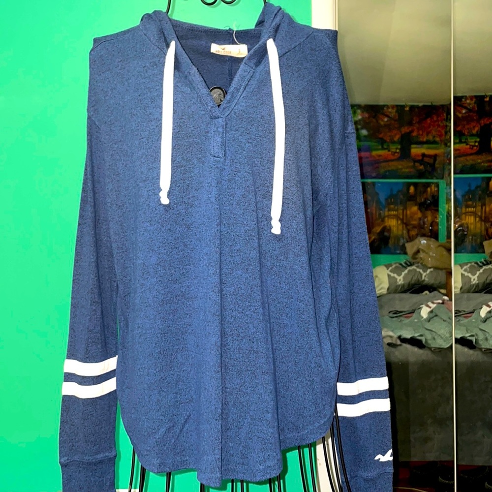 Blue Hollister pullover.